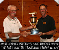 MIKE O'BRIEN PRESENTS DAVE KRUEGER WITH THE PAST HUNTER TRAVELING TROPHY 86 3/4 inches