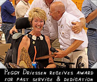 President Ron Rickman presents Peggy Dreissen with award in appreciation for her past service & dedication.