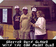 Greeter Ruth Glaser introduces the C&R Musky Club Team